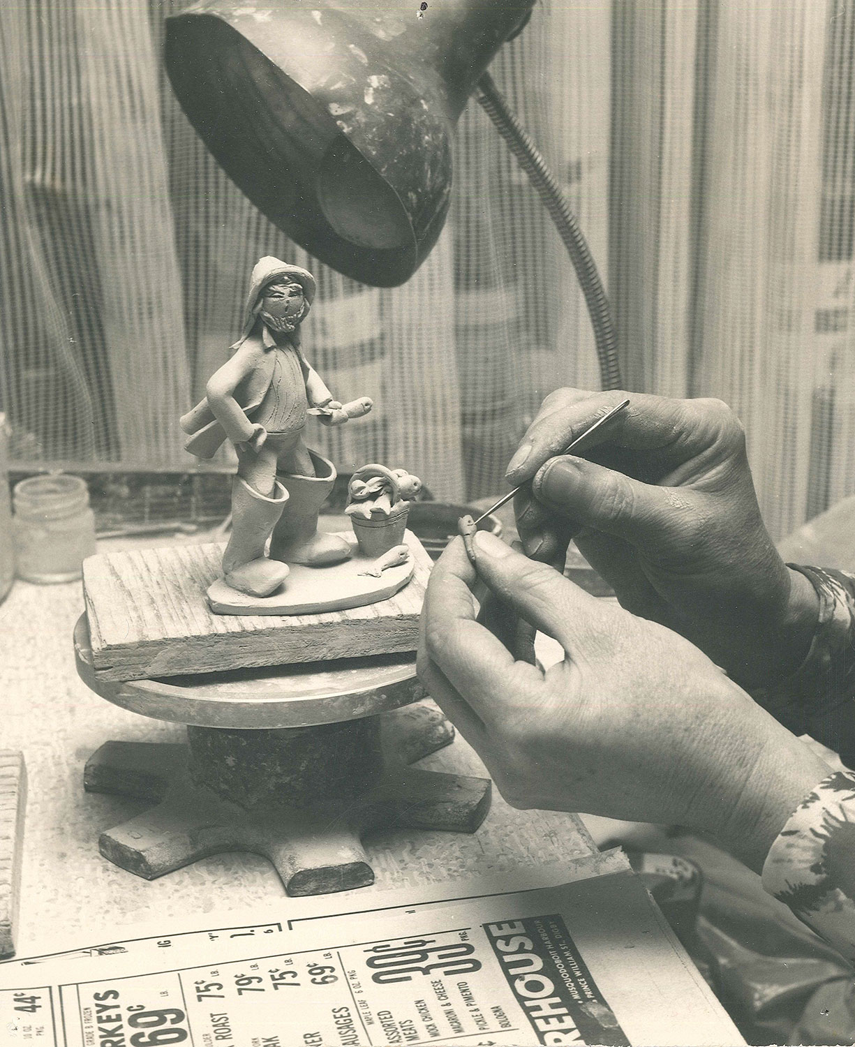 Elfreide's hands making figurine